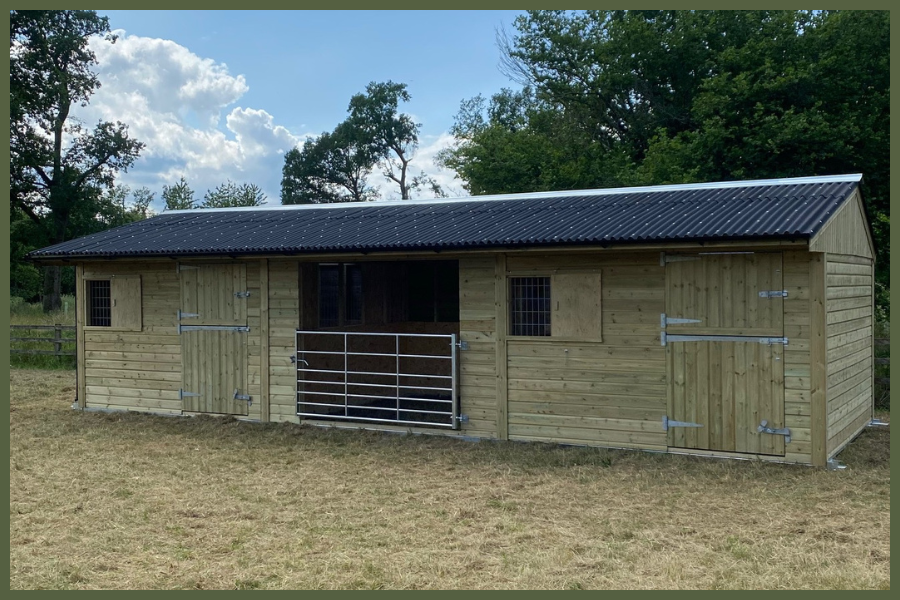 Double stable + gated loose box Double timber stable with gated loose box built by Longcross Stables