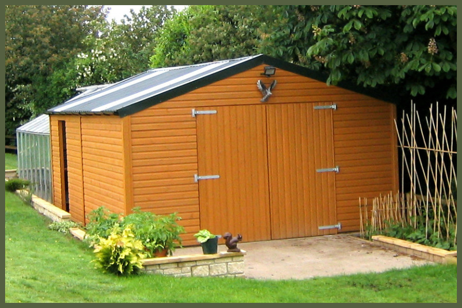 High-quality timber garden storage shed with solid wooden cladding, secure double doors, and a weatherproof roof, ideal for outdoor equipment and tools.